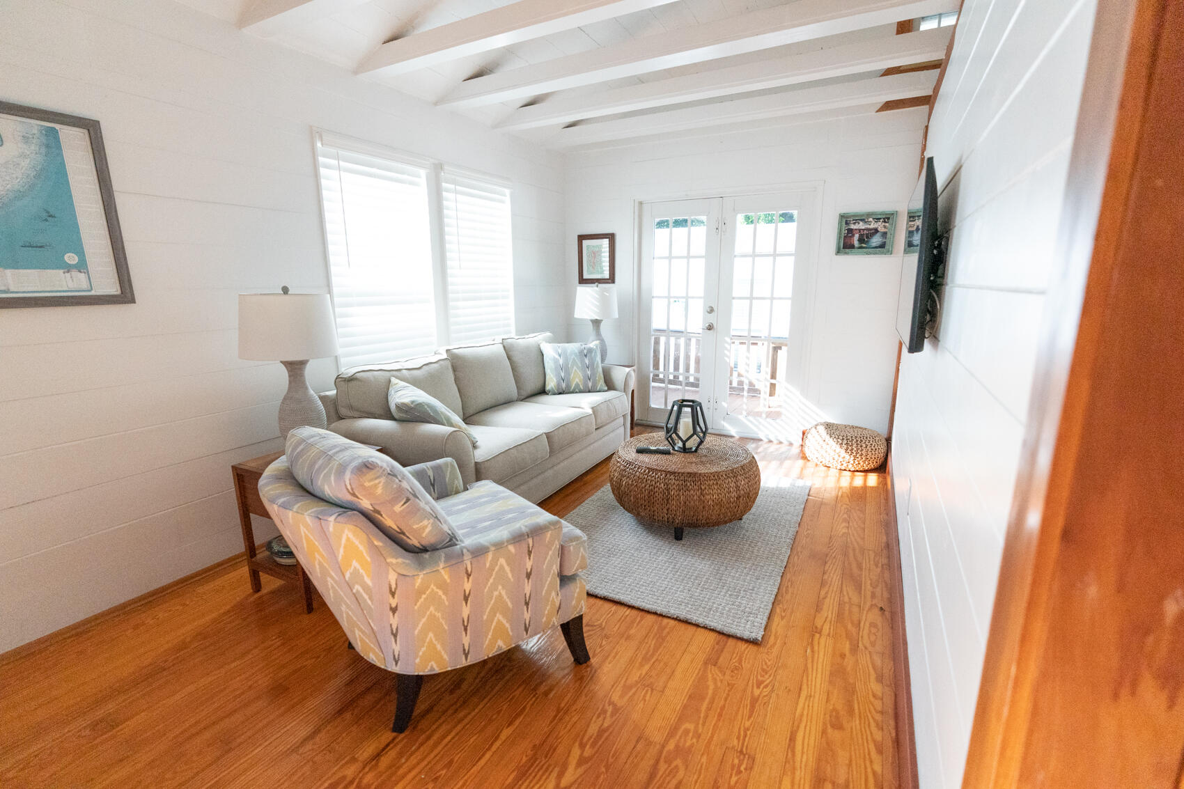 198 Beach Road Tavernier, FL 33070 - Photo 7 of 15 a living room with furniture and a wooden floor