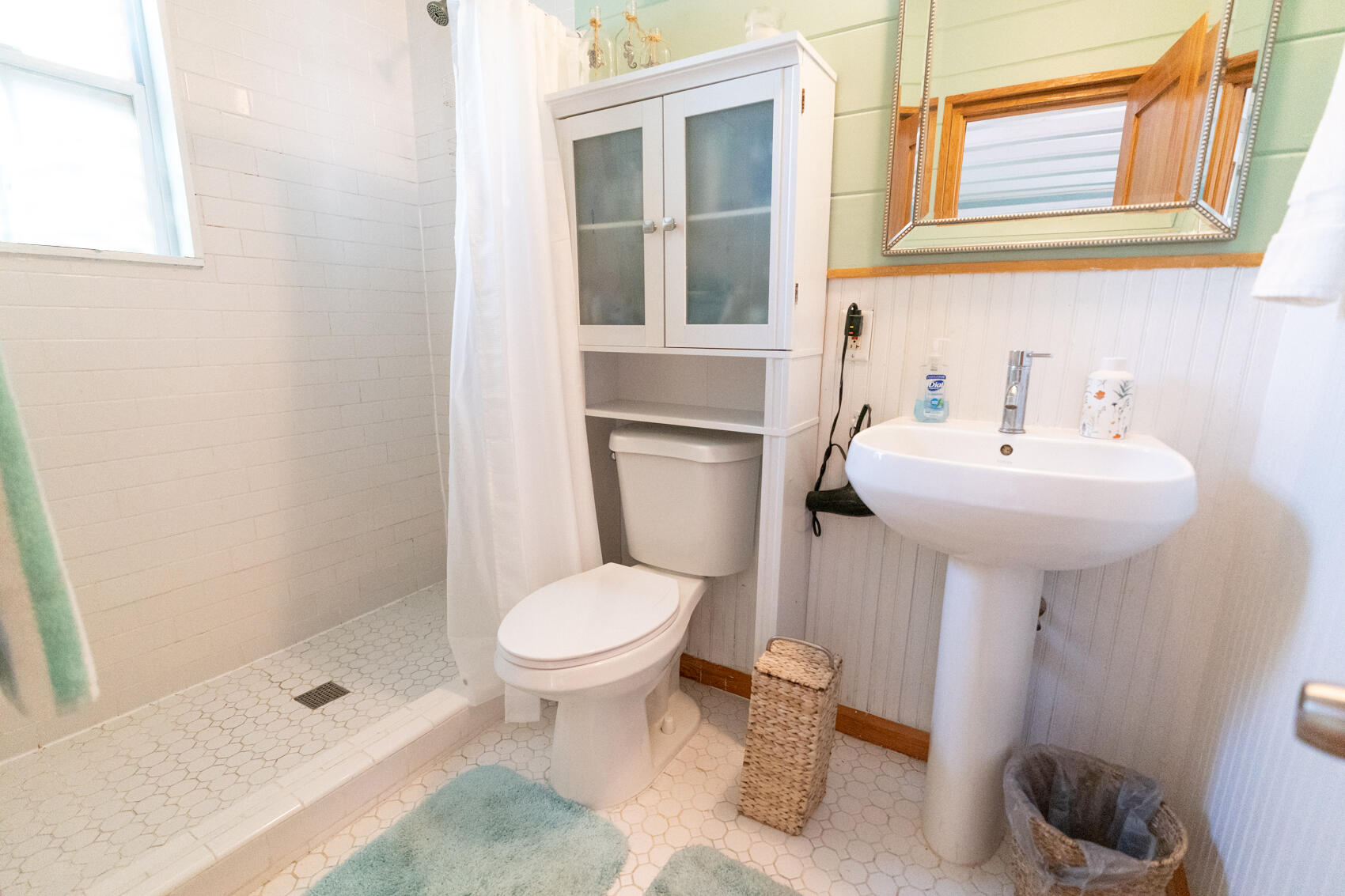 198 Beach Road Tavernier, FL 33070 - Photo 9 of 15 a bathroom with a sink toilet and shower