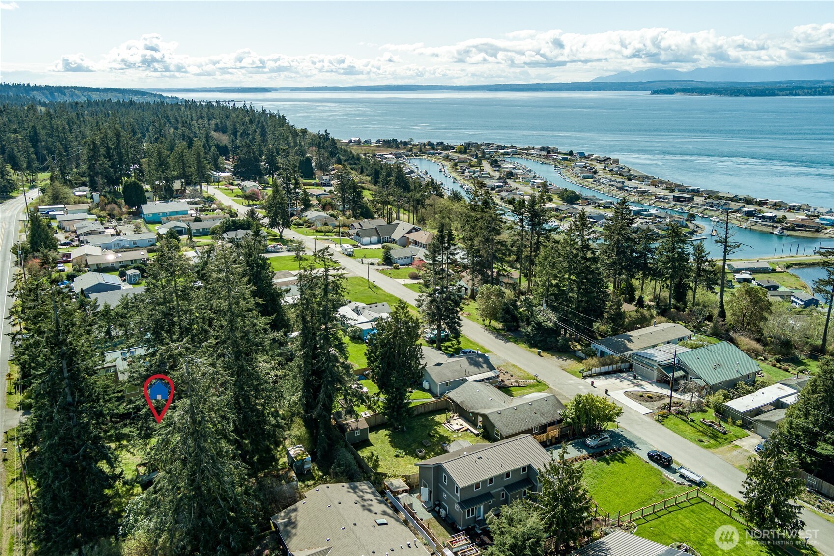 3544 South Smugglers Cove Road Greenbank, WA 98253 - Photo 12 of 23 a view of a lake with outdoor space