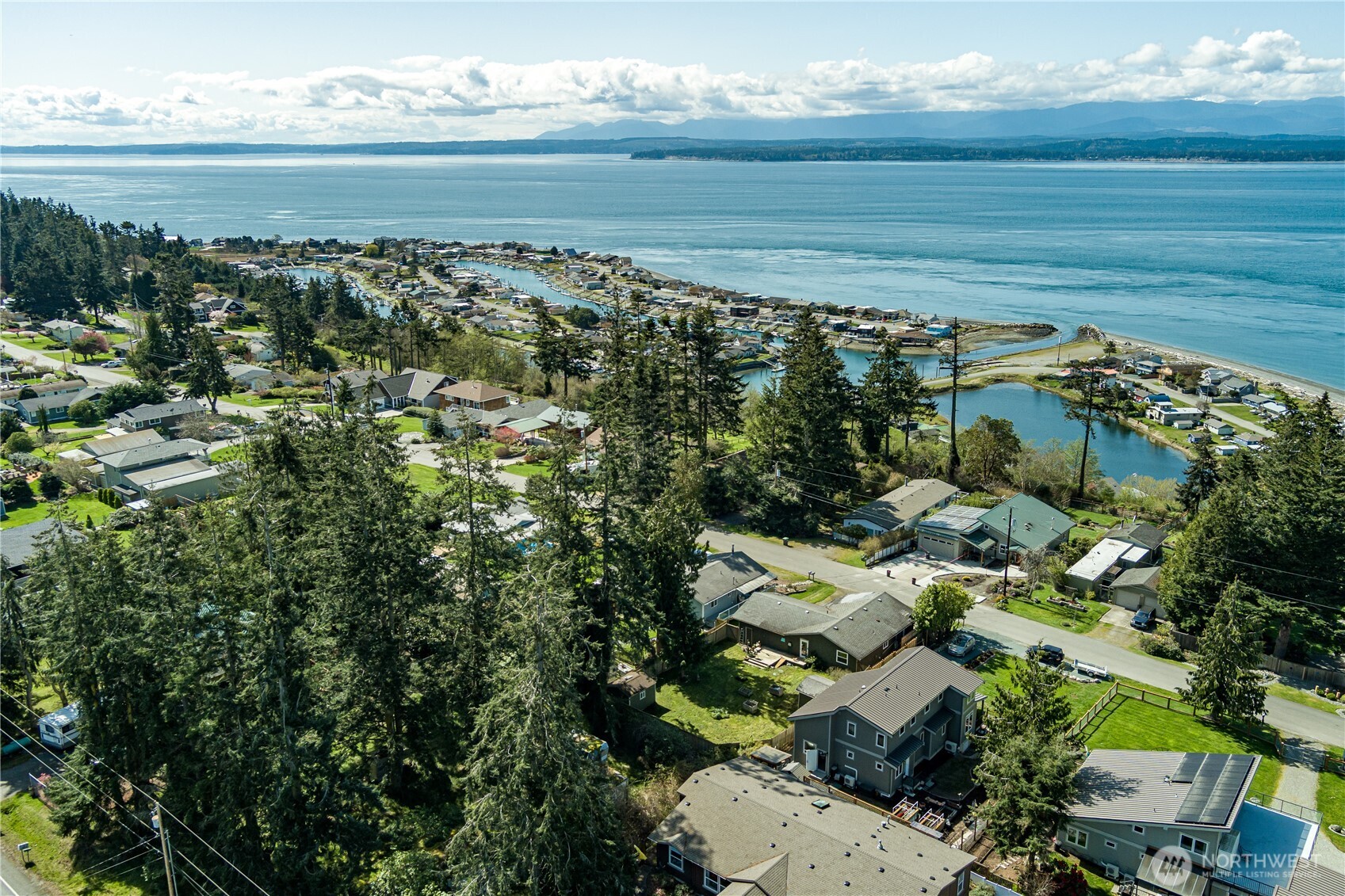 3544 South Smugglers Cove Road Greenbank, WA 98253 - Photo 14 of 23 a view of a lake with outdoor space