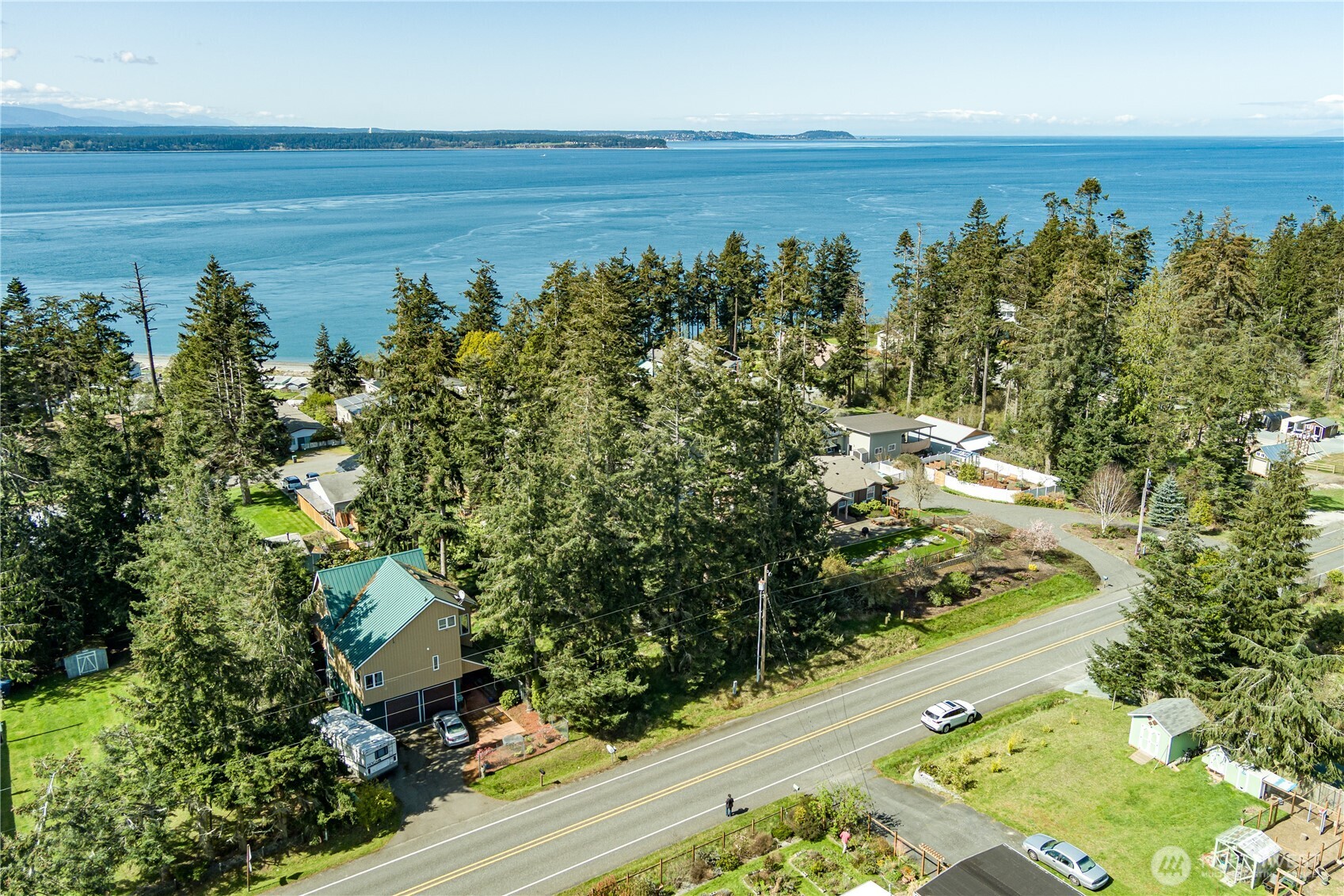3544 South Smugglers Cove Road Greenbank, WA 98253 - Photo 4 of 23 a view of a yard with an outdoor space