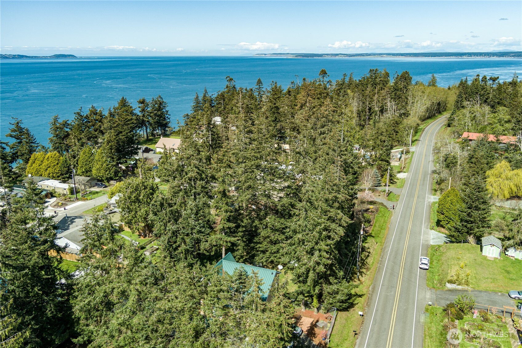 3544 South Smugglers Cove Road Greenbank, WA 98253 - Photo 6 of 23 a view of a yard with an outdoor space