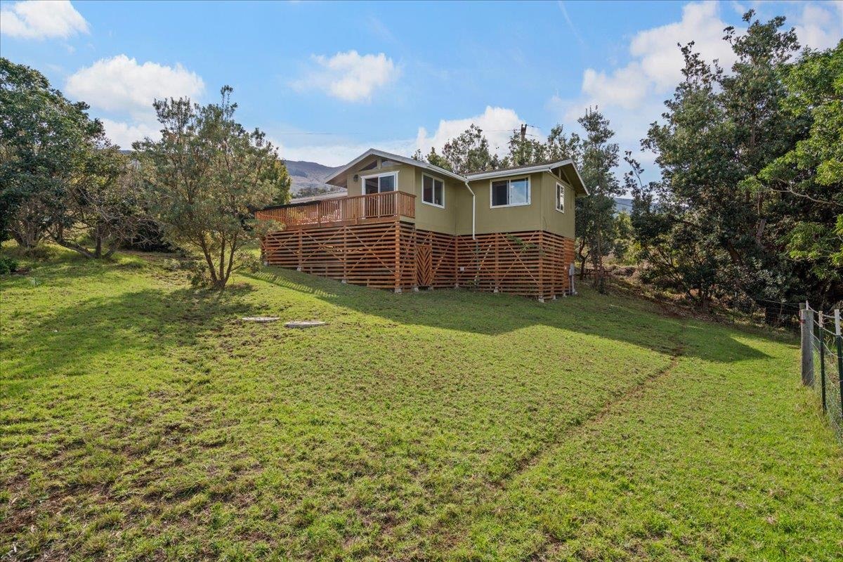 31 Hapapa Road, Unit B Kula, HI 96790 - Photo 17 of 50 a view of a house with backyard and a tree