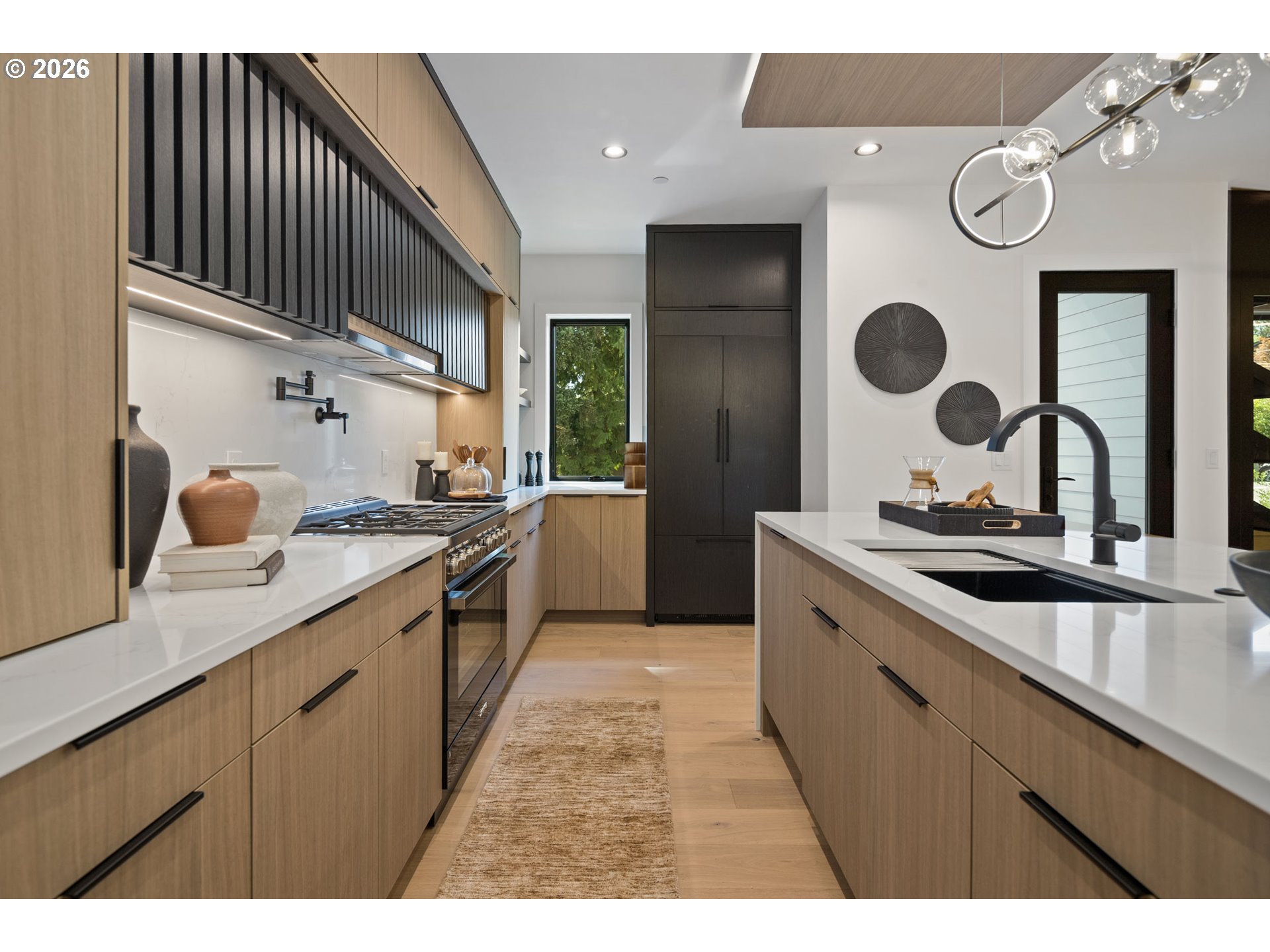 705 1st Street Lake Oswego, OR 97034 - Photo 11 of 35 a kitchen with a sink and a stove