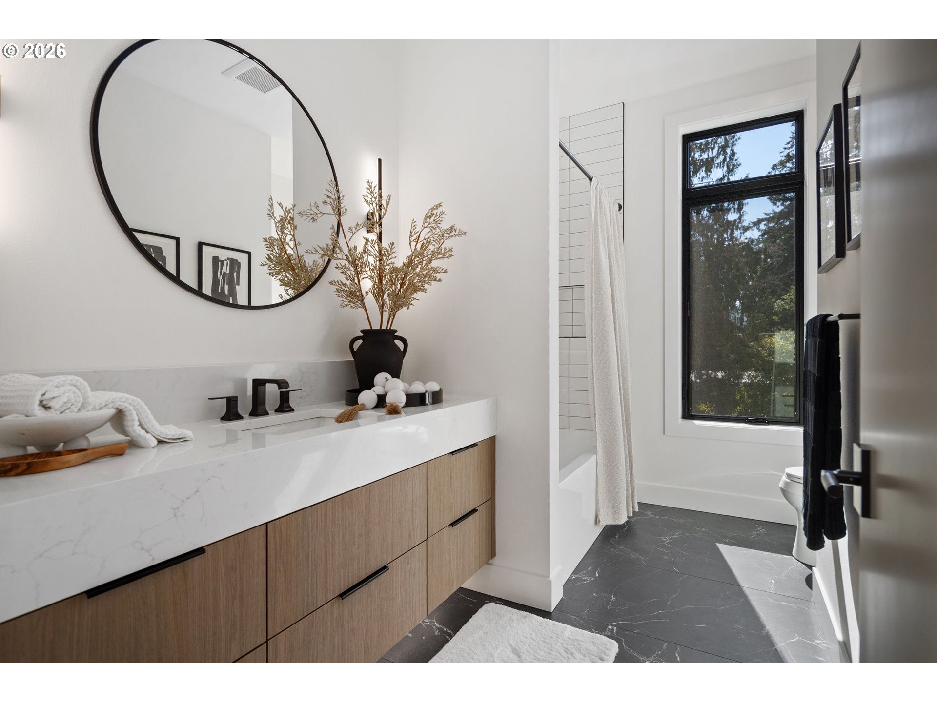 705 1st Street Lake Oswego, OR 97034 - Photo 23 of 35 a bathroom with a sink and a mirror