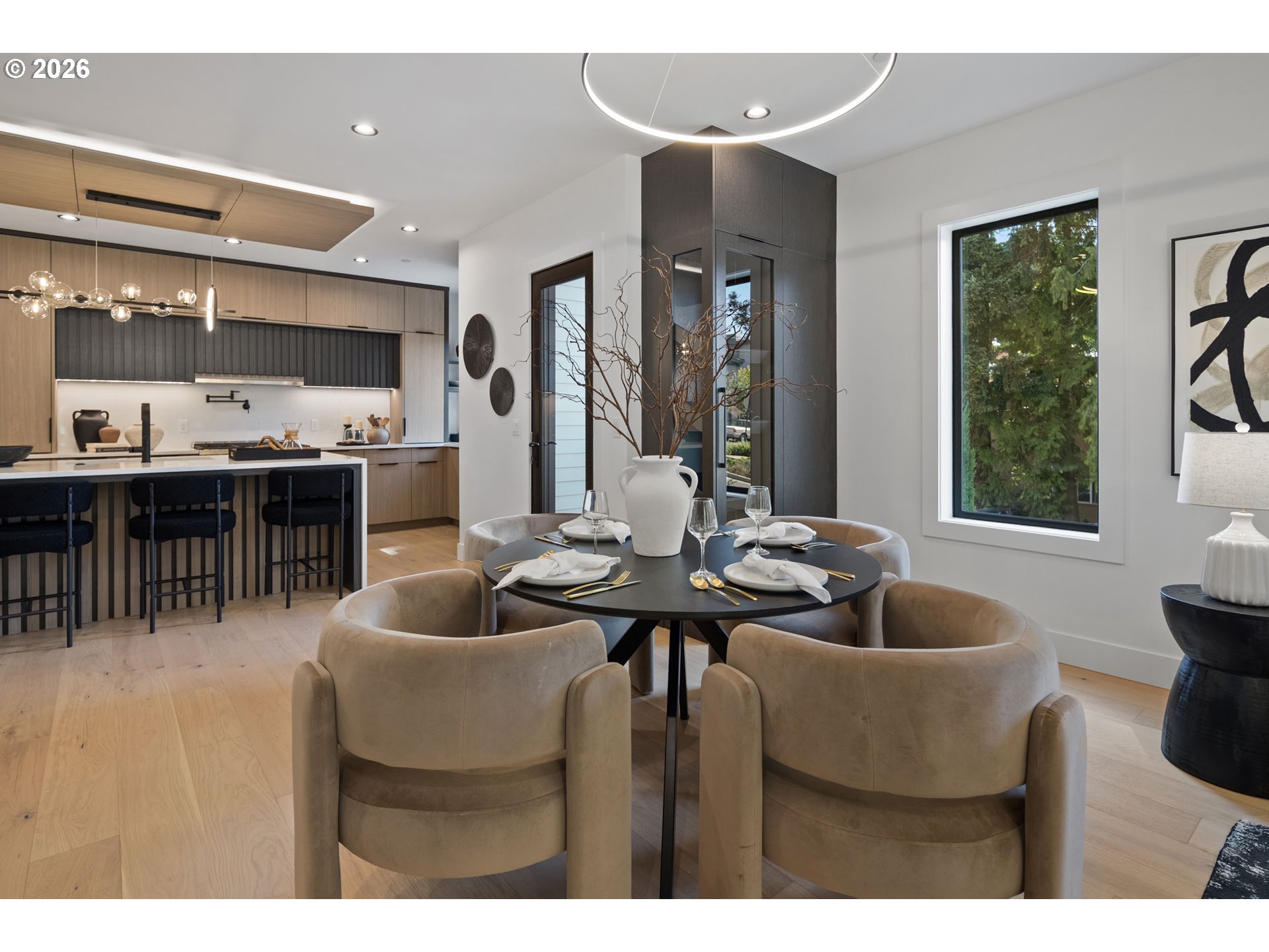 705 1st Street Lake Oswego, OR 97034 - Photo 5 of 35 a living room with furniture a large window and potted plant