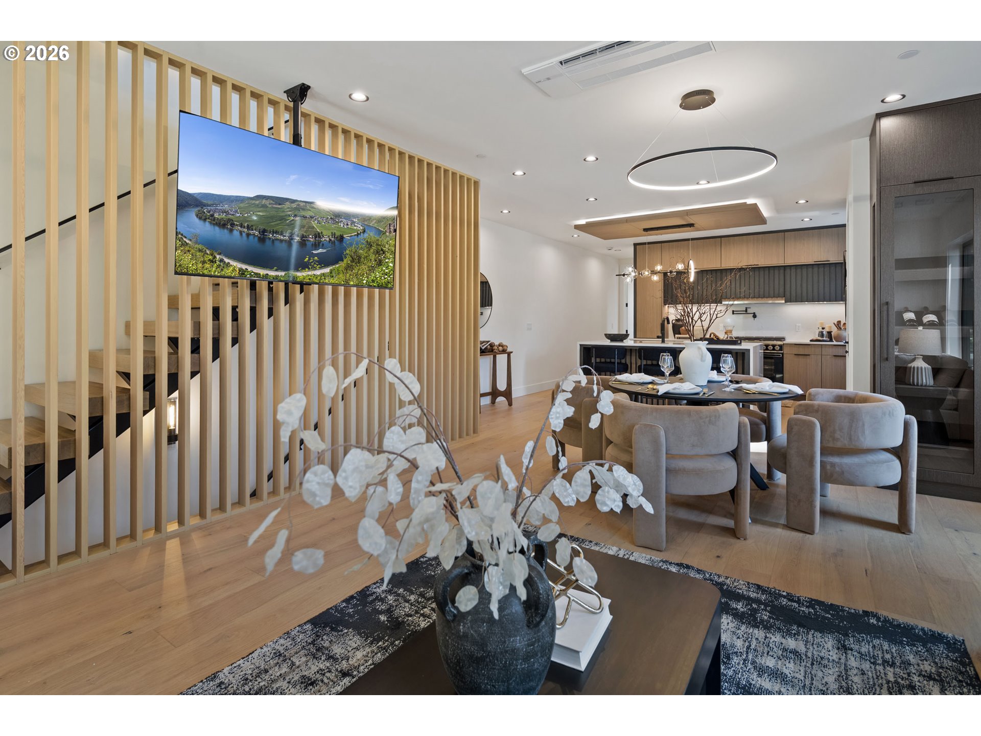 705 1st Street Lake Oswego, OR 97034 - Photo 9 of 35 a living room with lots of furniture and a large window