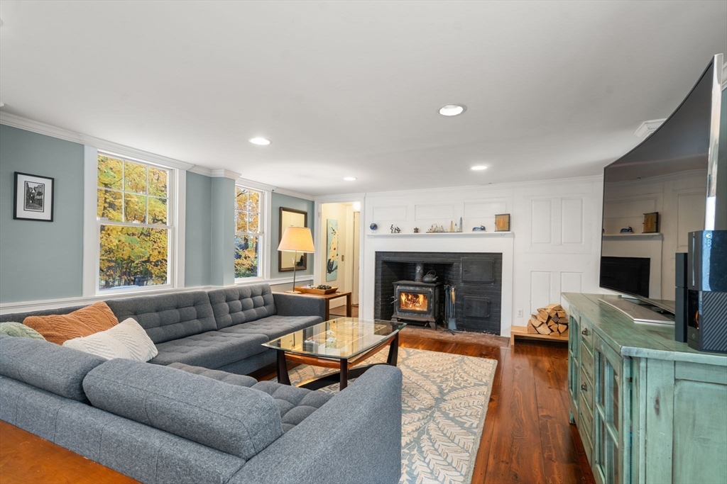463 Edmands Road Framingham, MA 01701 - Photo 19 of 42 a living room with furniture and a fireplace