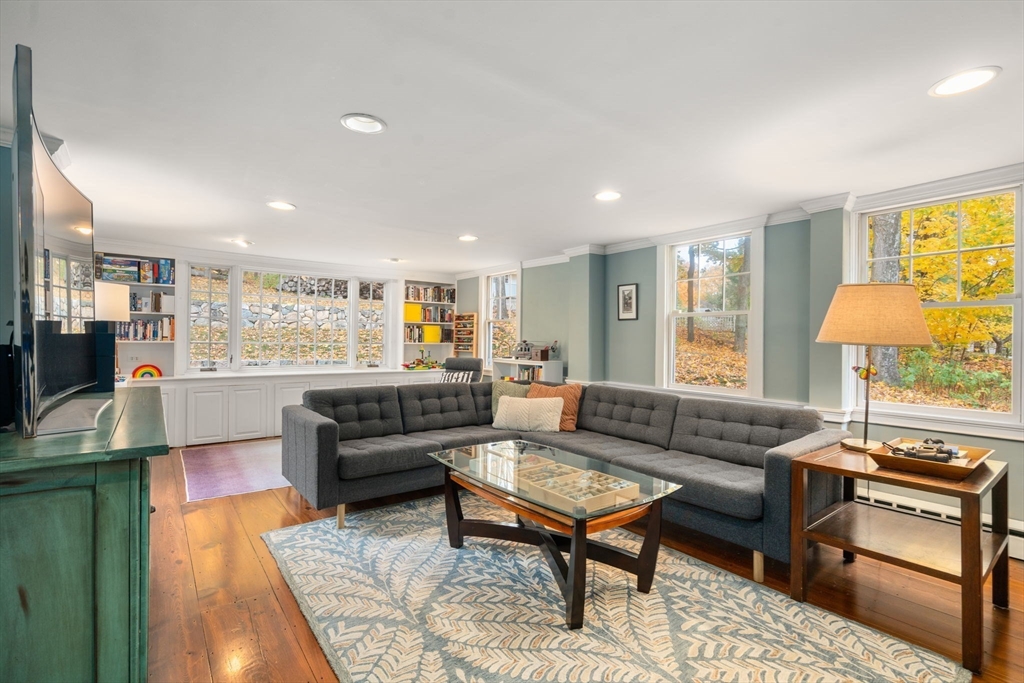 463 Edmands Road Framingham, MA 01701 - Photo 20 of 42 a living room with furniture and a table