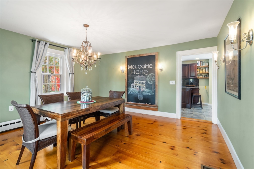 463 Edmands Road Framingham, MA 01701 - Photo 29 of 42 a view of a dining room with furniture and chandelier