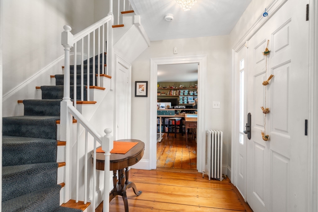 463 Edmands Road Framingham, MA 01701 - Photo 31 of 42 a view of entryway and hall with wooden floor