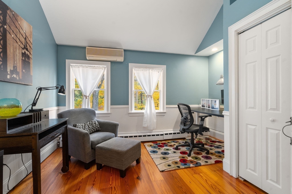 463 Edmands Road Framingham, MA 01701 - Photo 40 of 42 a living room with furniture and a wooden floor