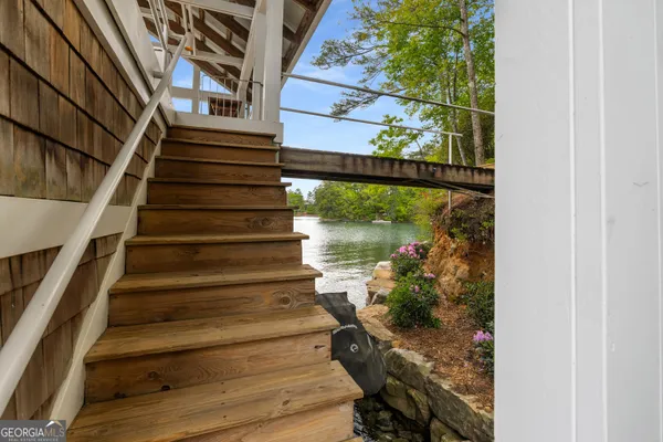 a view of balcony with furniture