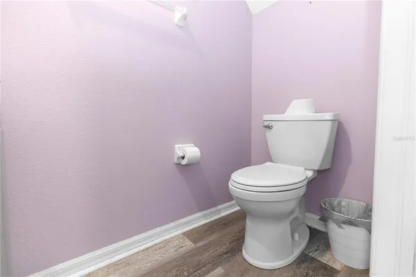 a bathroom with a sink a bathtub and a mirror