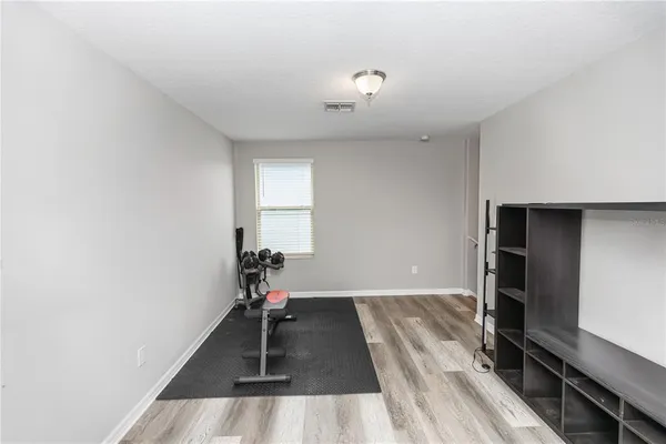 a view of a living room with a flat screen tv