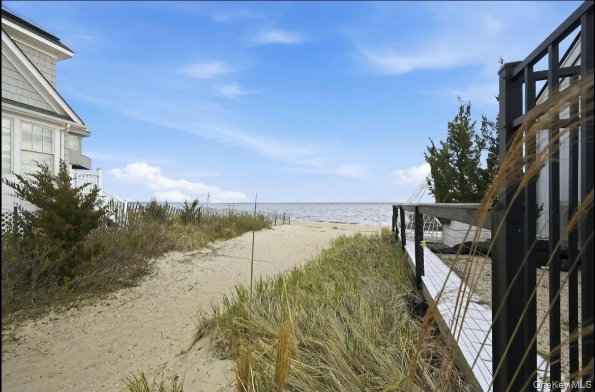 21 Locust Riverhead, NY 11901 - Photo 11 of 14 a view of a balcony with ocean view
