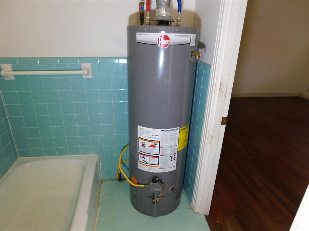 24044 Highway 157 Springhill, LA 71075 - Photo 32 of 40 a view of water heater room