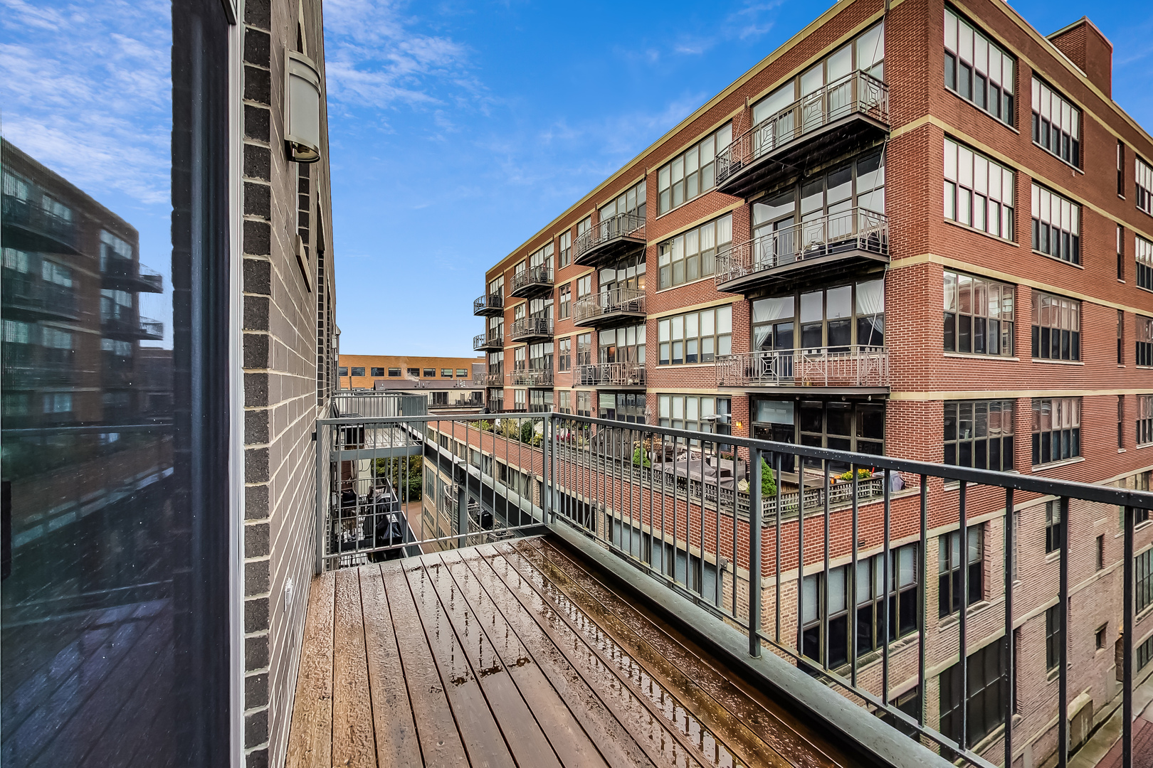 1247 West Madison Street, Unit 211 Chicago, IL 60607 - Photo 14 of 17 a view of balcony with a lake view