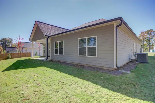 a view of backyard with a garden and plants