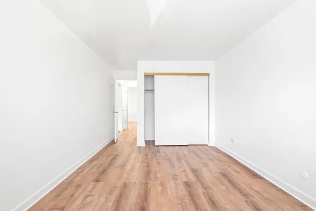 a view of a room that has a window in it