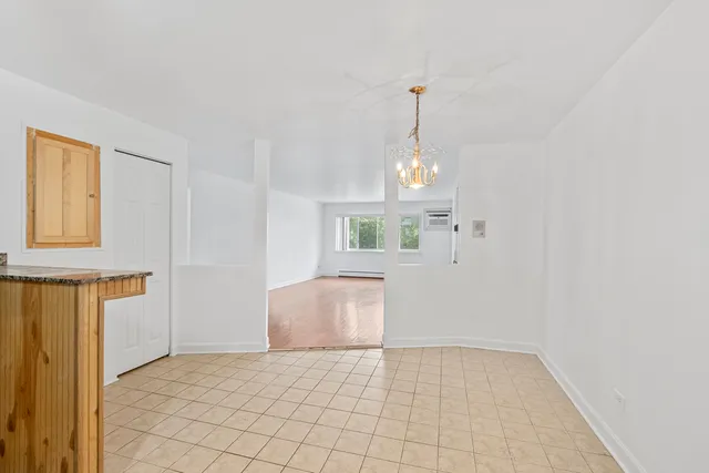 a view of a room with windows