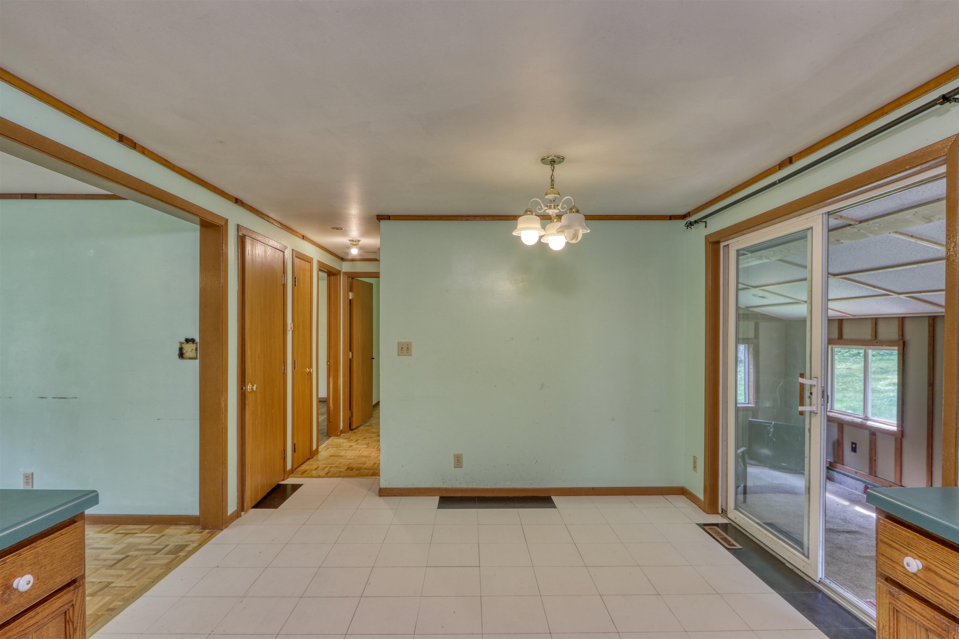 22655 Sunset Acres Lane Grand View, WI 54839 - Photo 13 of 47 Unfurnished dining area with a chandelier and crown molding