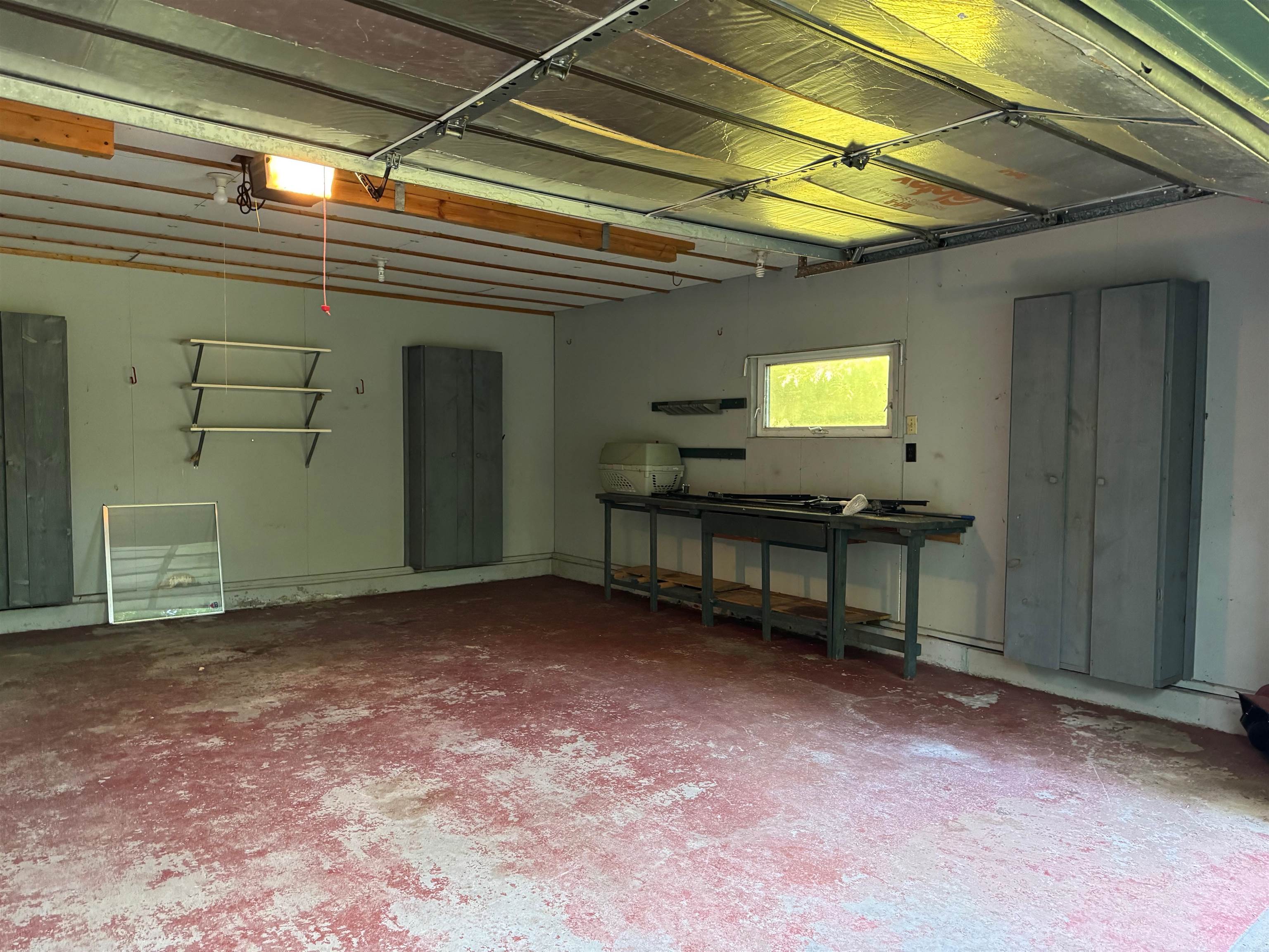 22655 Sunset Acres Lane Grand View, WI 54839 - Photo 27 of 47 Garage with a garage door opener