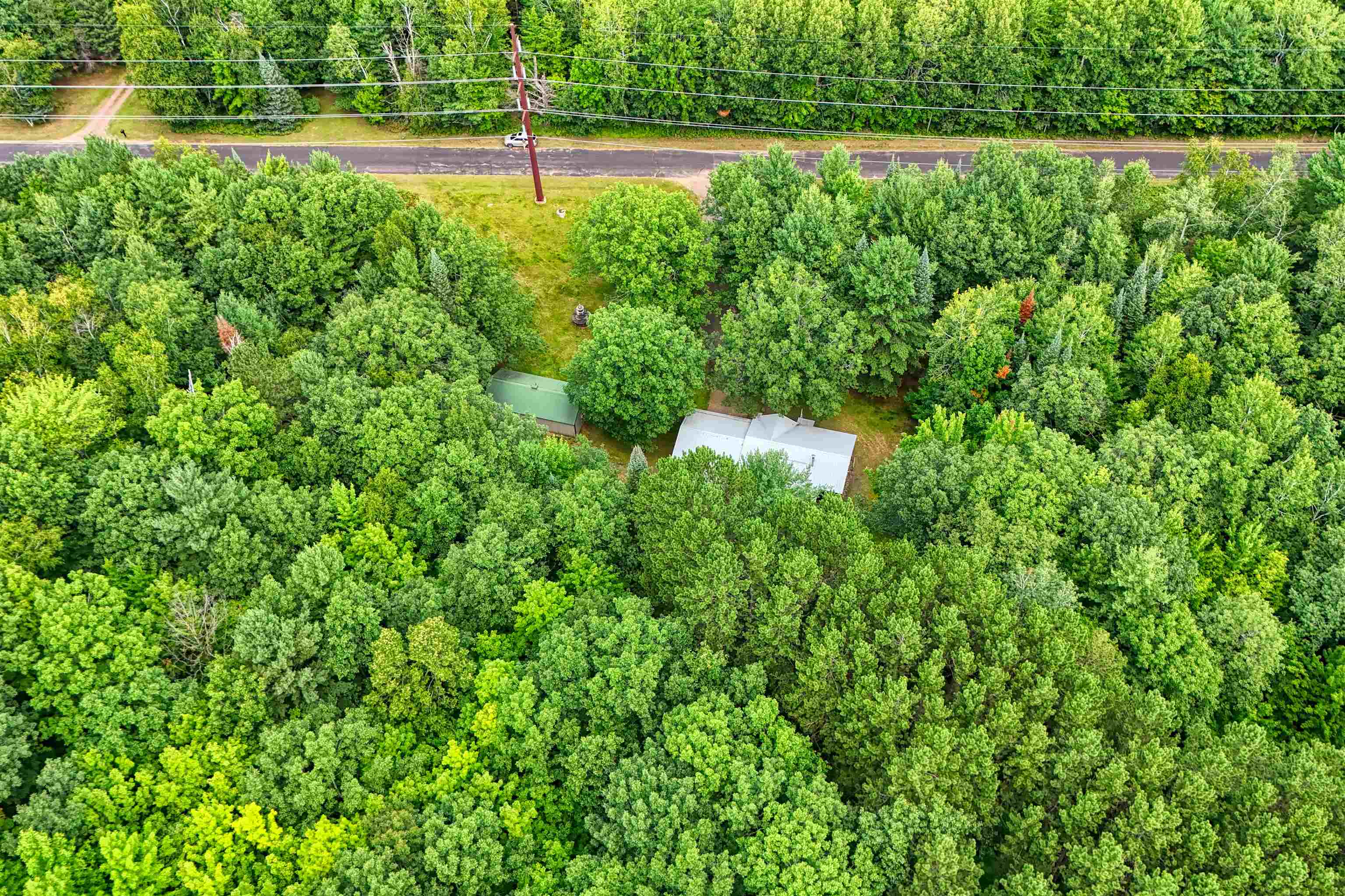 22655 Sunset Acres Lane Grand View, WI 54839 - Photo 36 of 47 Drone / aerial view of a heavily wooded area