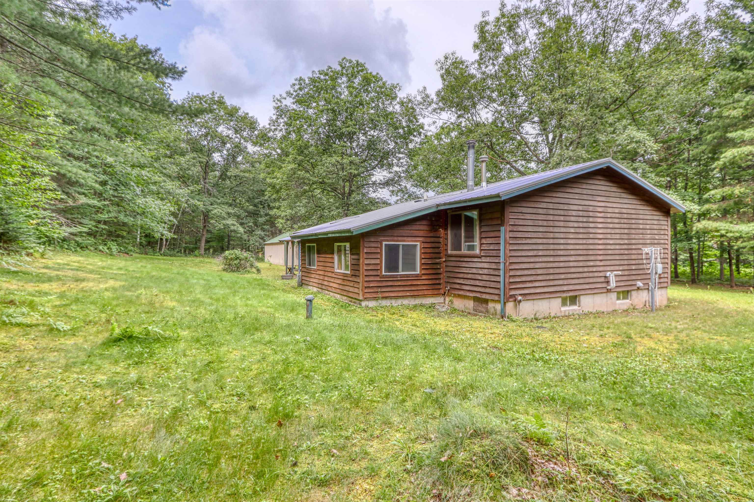 22655 Sunset Acres Lane Grand View, WI 54839 - Photo 44 of 47 View of side of home with a yard