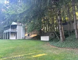 a view of a lake from a yard