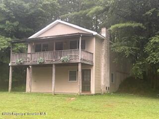 1171 Heart Lake Road Montrose, PA 18801 - Photo 2 of 56 a house with swimming pool