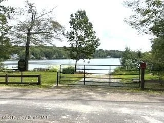 a view of a livingroom with furniture and a table