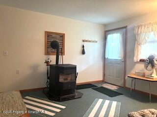 1171 Heart Lake Road Montrose, PA 18801 - Photo 28 of 56 a living room with furniture and a window