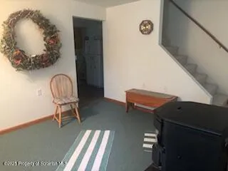 a bathroom with a sink a mirror and a shower curtain