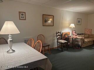 1171 Heart Lake Road Montrose, PA 18801 - Photo 37 of 57 a living room with furniture and a lamp
