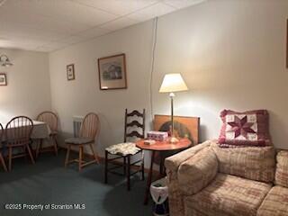 1171 Heart Lake Road Montrose, PA 18801 - Photo 38 of 56 a living room with furniture a lamp and a window