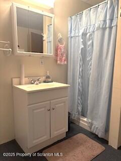 1171 Heart Lake Road Montrose, PA 18801 - Photo 43 of 57 a bathroom with a sink a mirror and a shower curtain