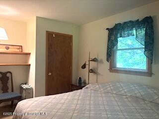 1171 Heart Lake Road Montrose, PA 18801 - Photo 57 of 57 a bedroom with a bed and a window