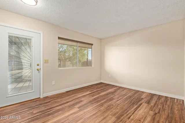 a picture of a room with a white wall and white walls