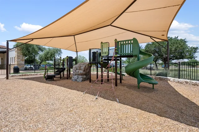 a view of a building with sitting area
