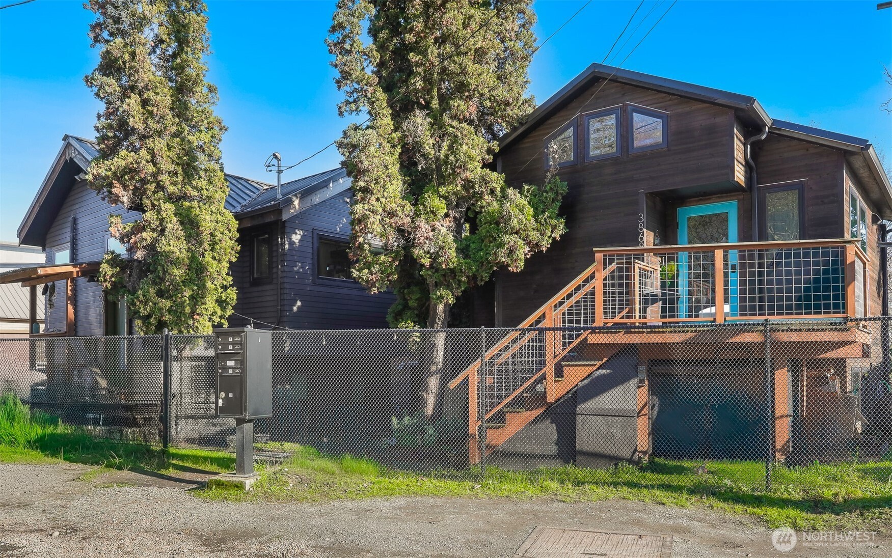 3868 16th Avenue Southwest Seattle, WA 98106 - Photo 1 of 37 a front view of a house with garden