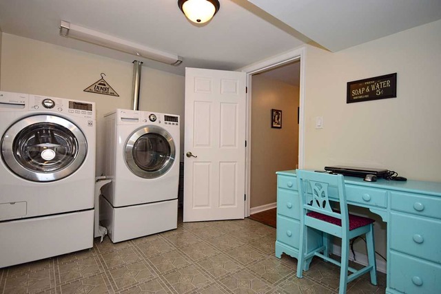 1219 Good Avenue Park Ridge, IL 60068 - Photo 19 of 25 a utility room with dryer and washer