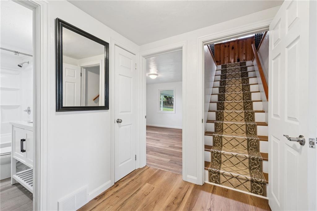 13379 Ridge Road Irwin, PA 15642 - Photo 22 of 38 STAIRS TO FINISHED GAMEROOM