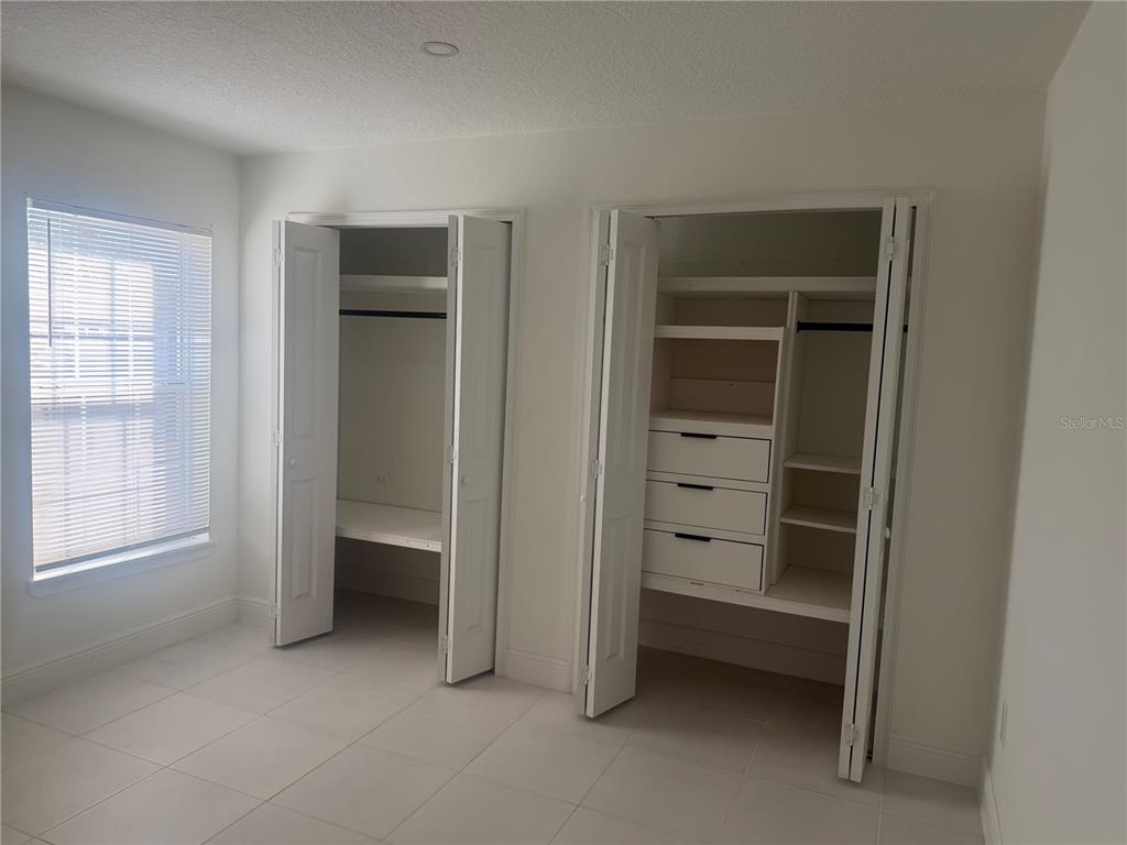 3444 Packard Avenue St. Cloud, FL 34772 - Photo 21 of 28 a view of an empty room with a closet