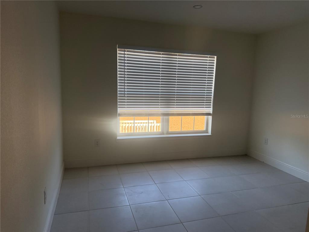 3444 Packard Avenue St. Cloud, FL 34772 - Photo 22 of 28 a view of an empty room with a window