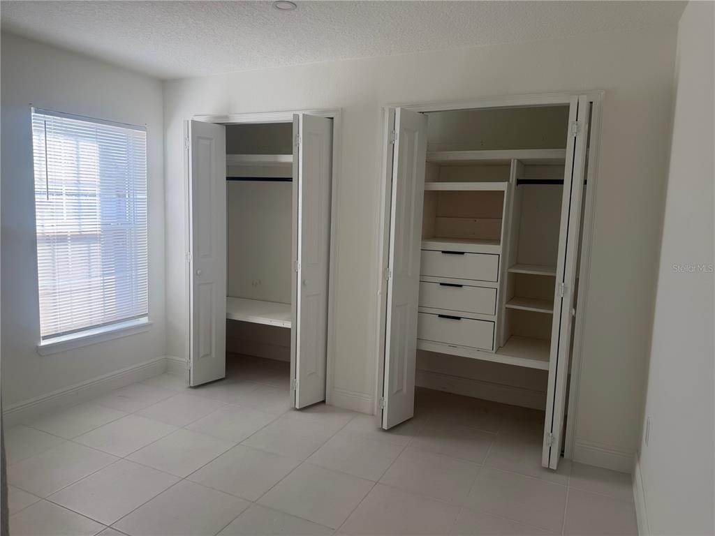 3444 Packard Avenue St. Cloud, FL 34772 - Photo 26 of 28 a view of an empty room with closet and a window