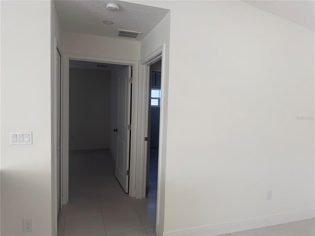 3444 Packard Avenue St. Cloud, FL 34772 - Photo 27 of 28 a view of a hallway