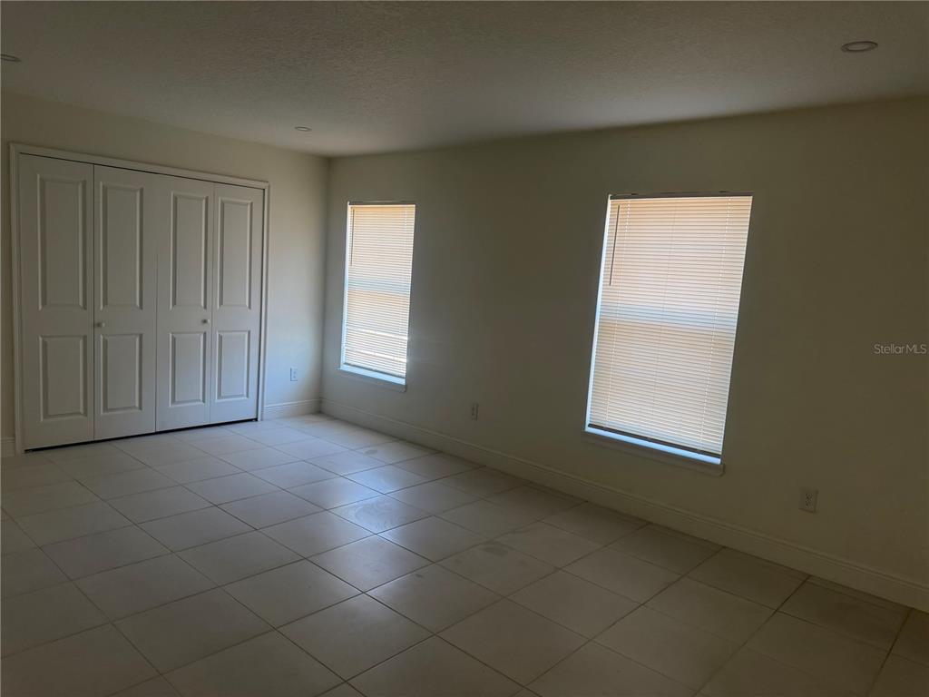 3444 Packard Avenue St. Cloud, FL 34772 - Photo 28 of 28 an empty room with windows