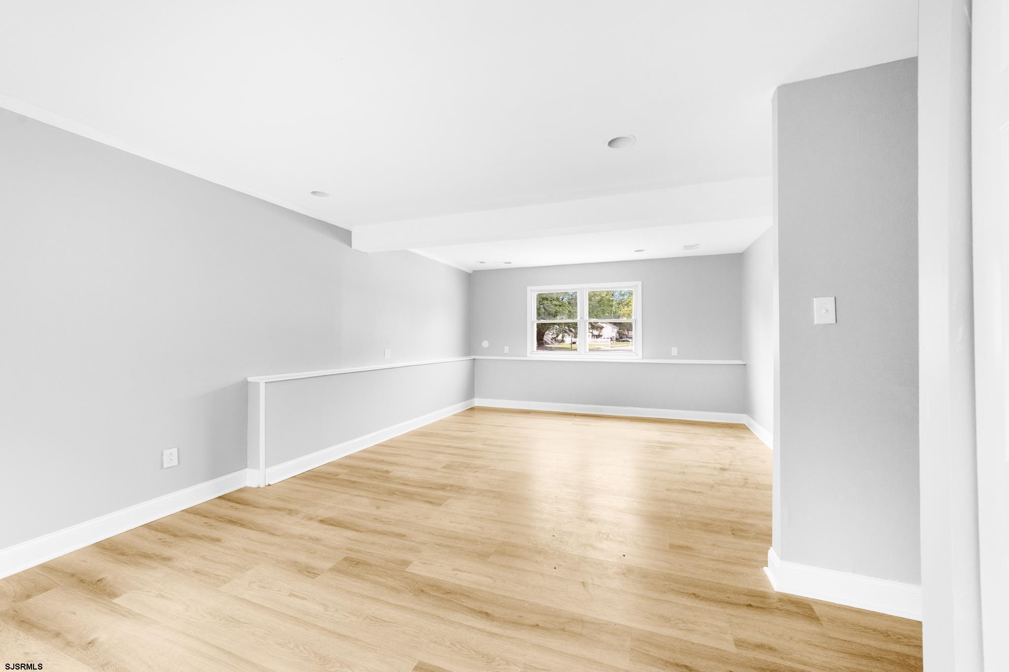 243 Wintergreen Lane Penns Grove, NJ 08069 - Photo 22 of 32 a view of an empty room with a window
