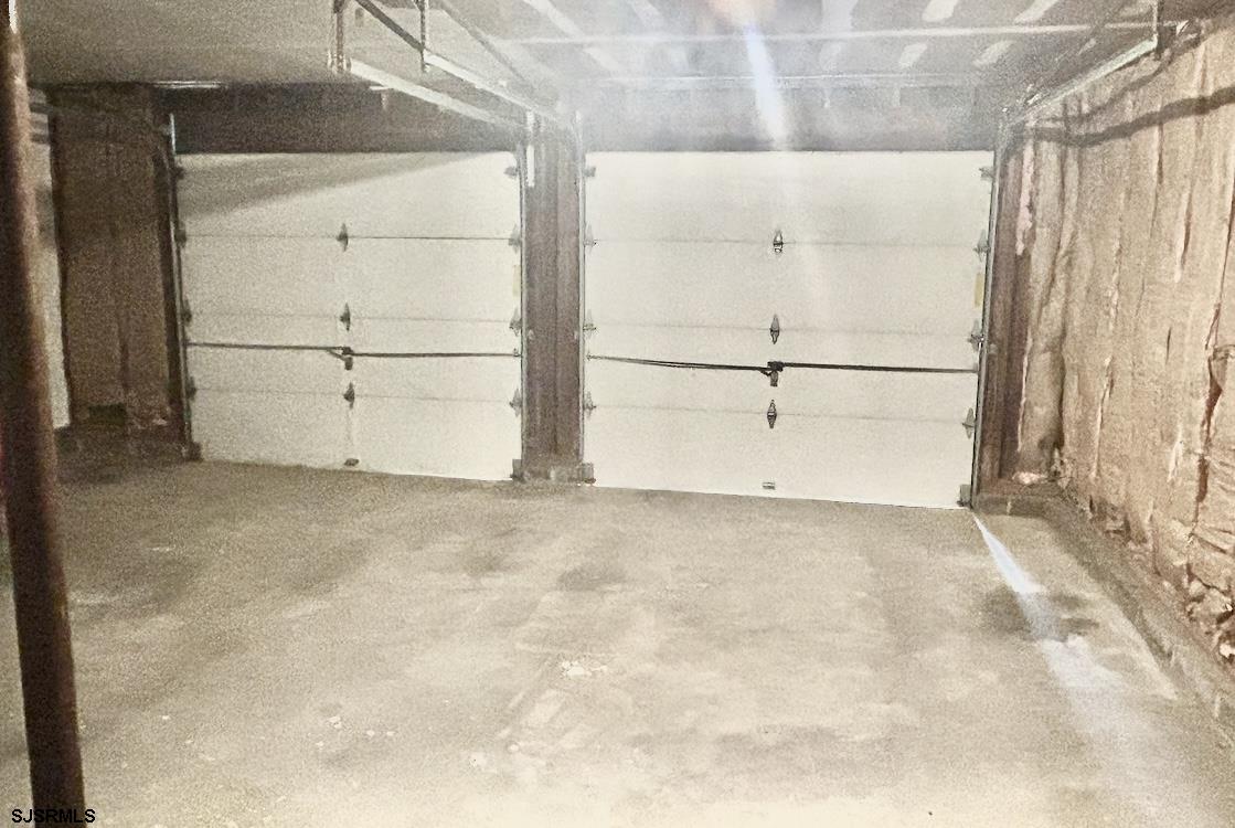 243 Wintergreen Lane Penns Grove, NJ 08069 - Photo 25 of 32 a view of a garage